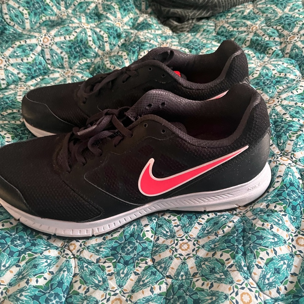 Ladies Nike Black Sneakers with coral swoosh Accents